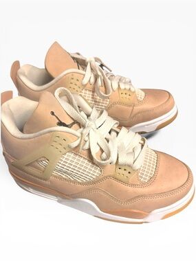 Nike Air Jordan 4 Retro 'Shimmer' women's sneakers featuring a tan leather